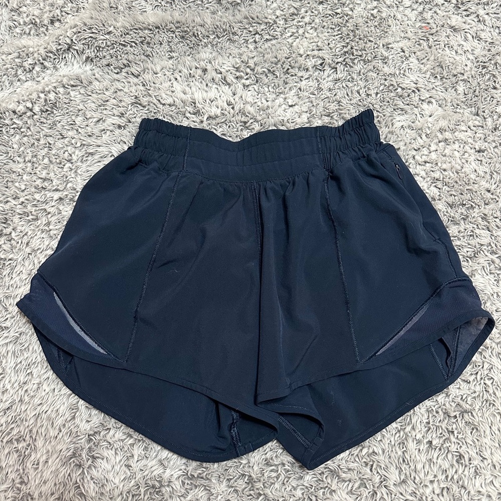 Lululemon navy blue hotty hot low rise 2.5 inch 0 tall.